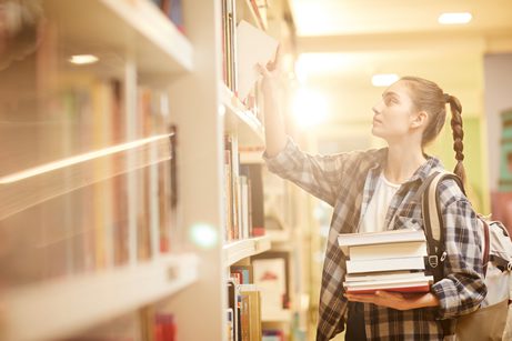 Blog page pics girl in library with books